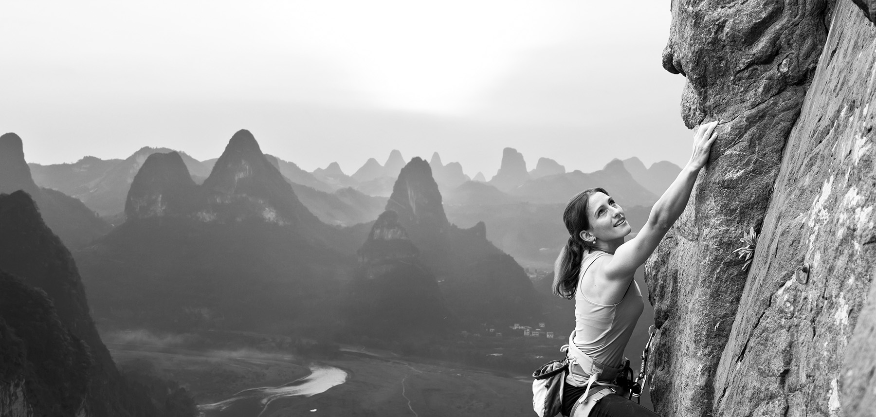 A woman rock climbing