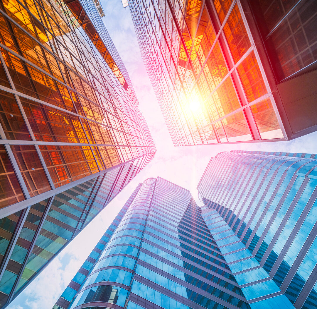 Image of sun shining on buildings